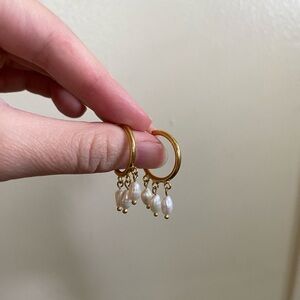 Gold hoops with authentic pearls. Good condition. 3 pearls per earring.